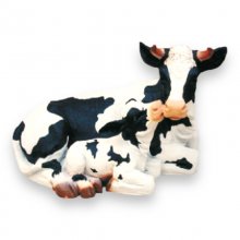 Kuh liegend mit Kalb