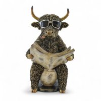 Kuh mit Zeitung Kuh mit Zeitung