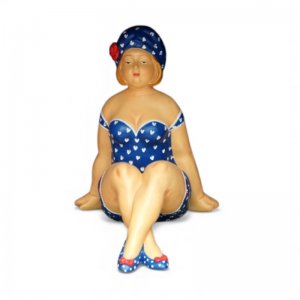 Badende Frau sitzt mit Rose, blau